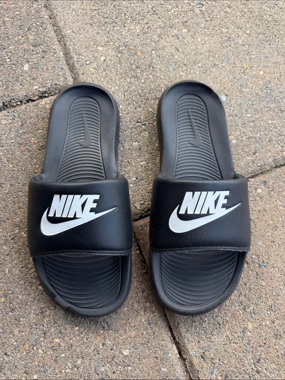 Nike Black Slides with White Swoosh Logo